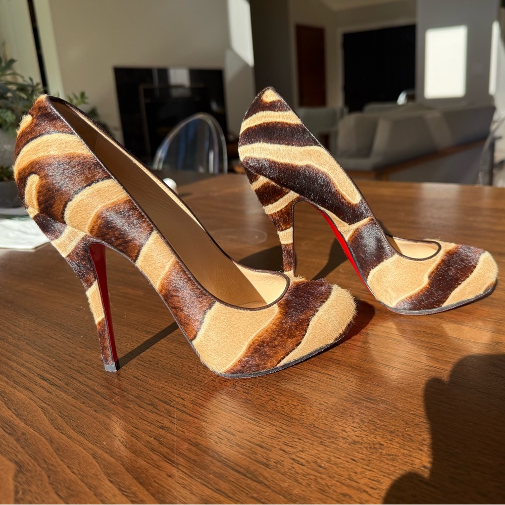 CHRISTIAN LOUBOUTIN Stunning new condition calf hair tiger print heels.